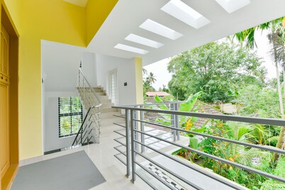 Luxurious 2 BHK house amid lush greenery and in a village like atmosphere.