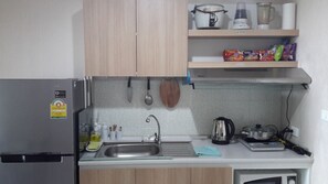 Fridge, microwave, toaster, cookware/dishes/utensils