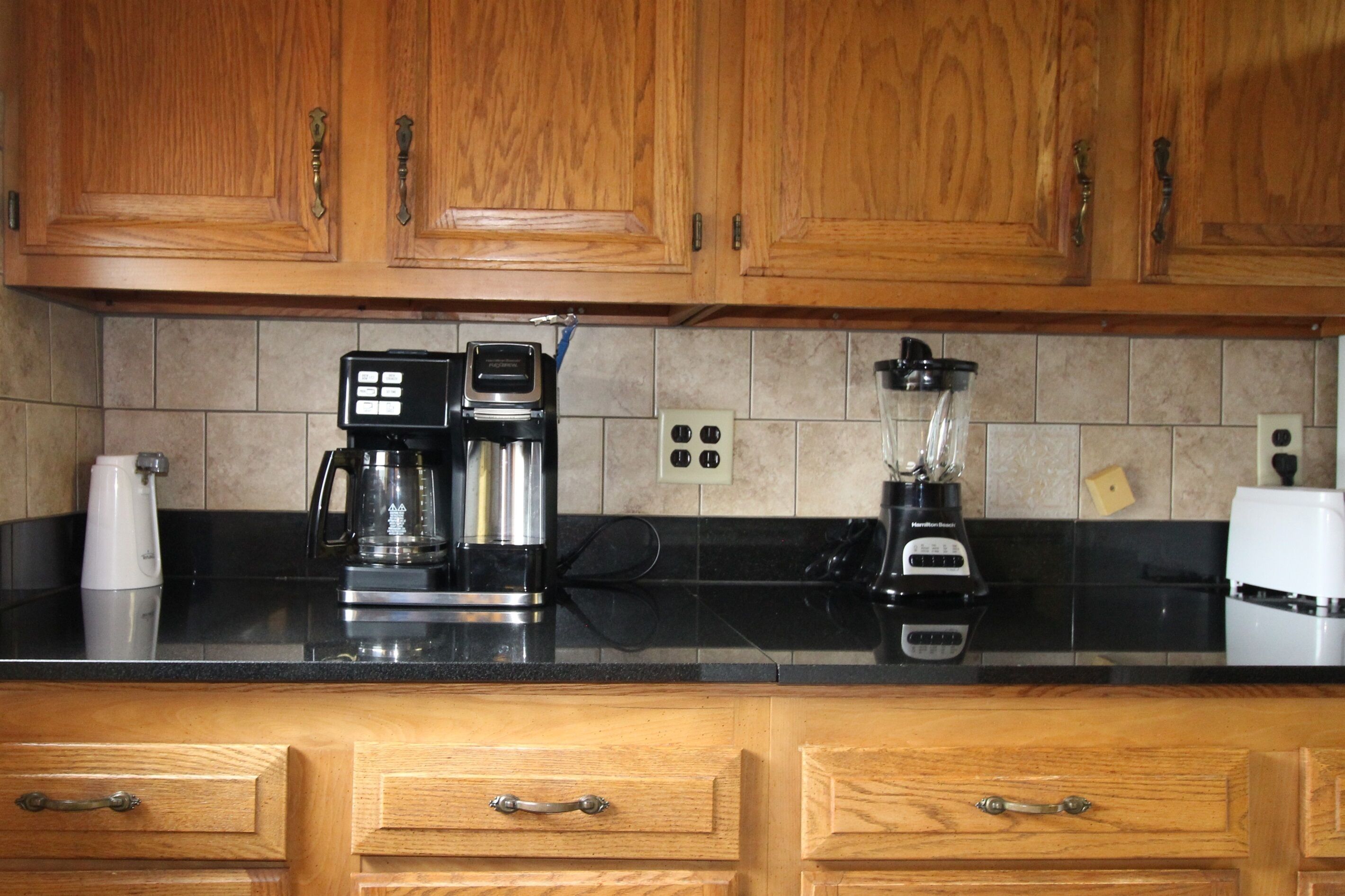Coffee/tea maker, fridge, microwave, oven