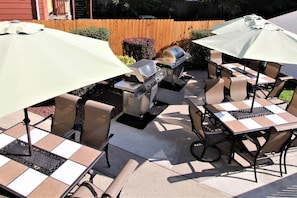 Enjoy al fresco dining on the patio, where a barbecue grill and comfortable seating await.