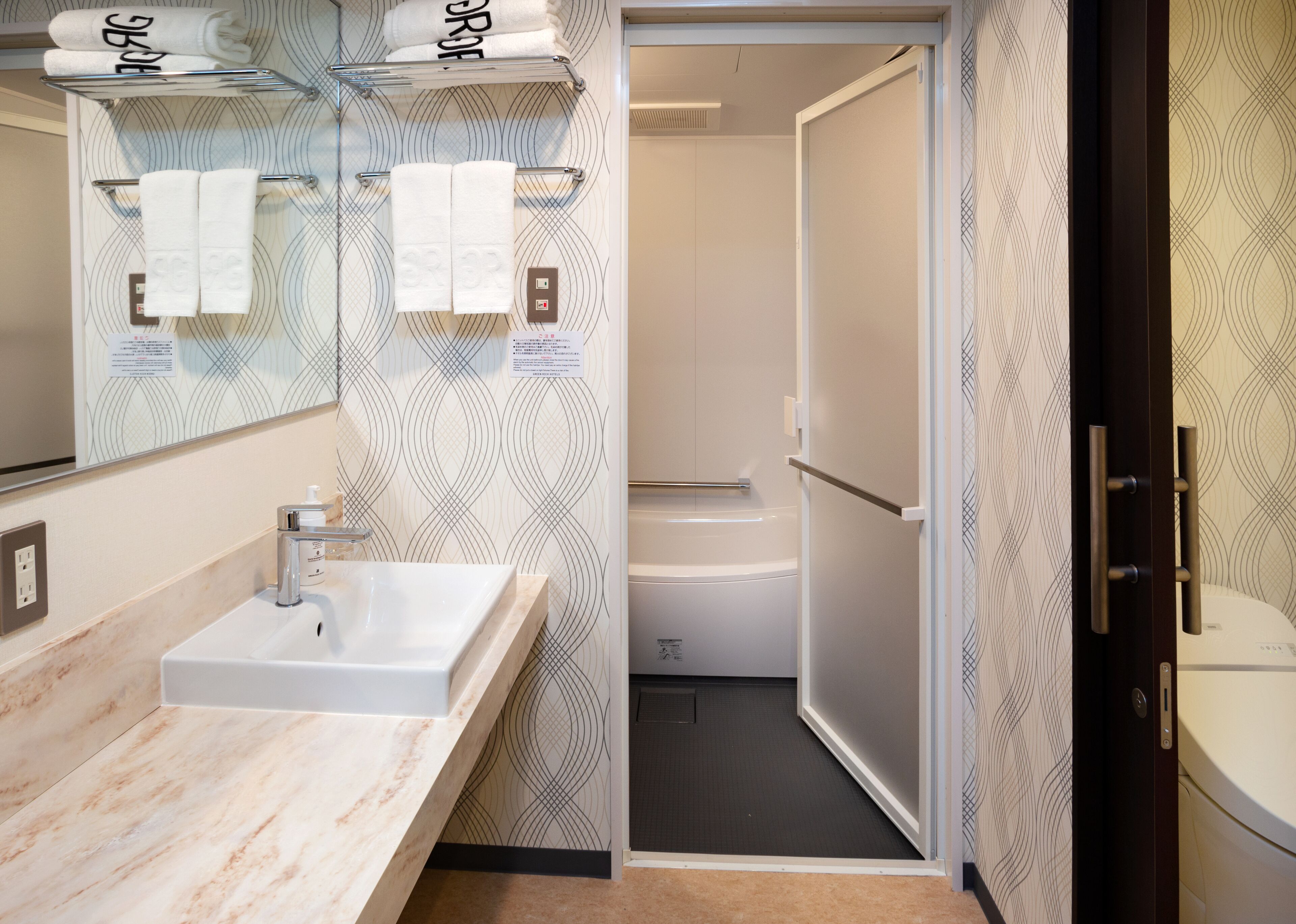 combined shower/bathtub, free toiletries, hair dryer, slippers