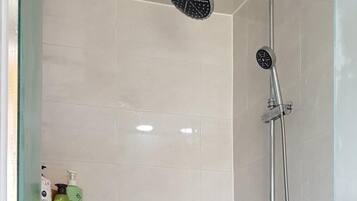 Shower, free toiletries, hair dryer, slippers