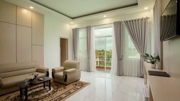 Suite, Pool View | Minibar, in-room safe, desk, blackout drapes