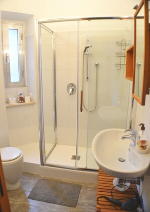Hair dryer, towels, toilet paper