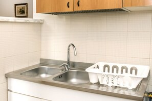 Fridge, oven, dining tables