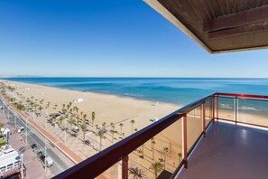 On the beach, sun-loungers