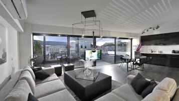 Luxury Loft | Living area | Flat-screen TV