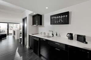 Fridge, coffee/tea maker, toaster, cookware/dishes/utensils
