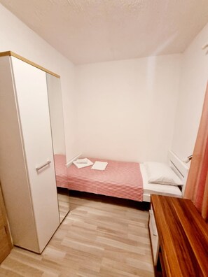 2 quartos, Wi-Fi de cortesia, roupa de cama