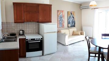 Apartment, 2 Bedrooms, Sea View (02) | Private kitchen | Full-sized fridge, oven, stovetop, coffee/tea maker
