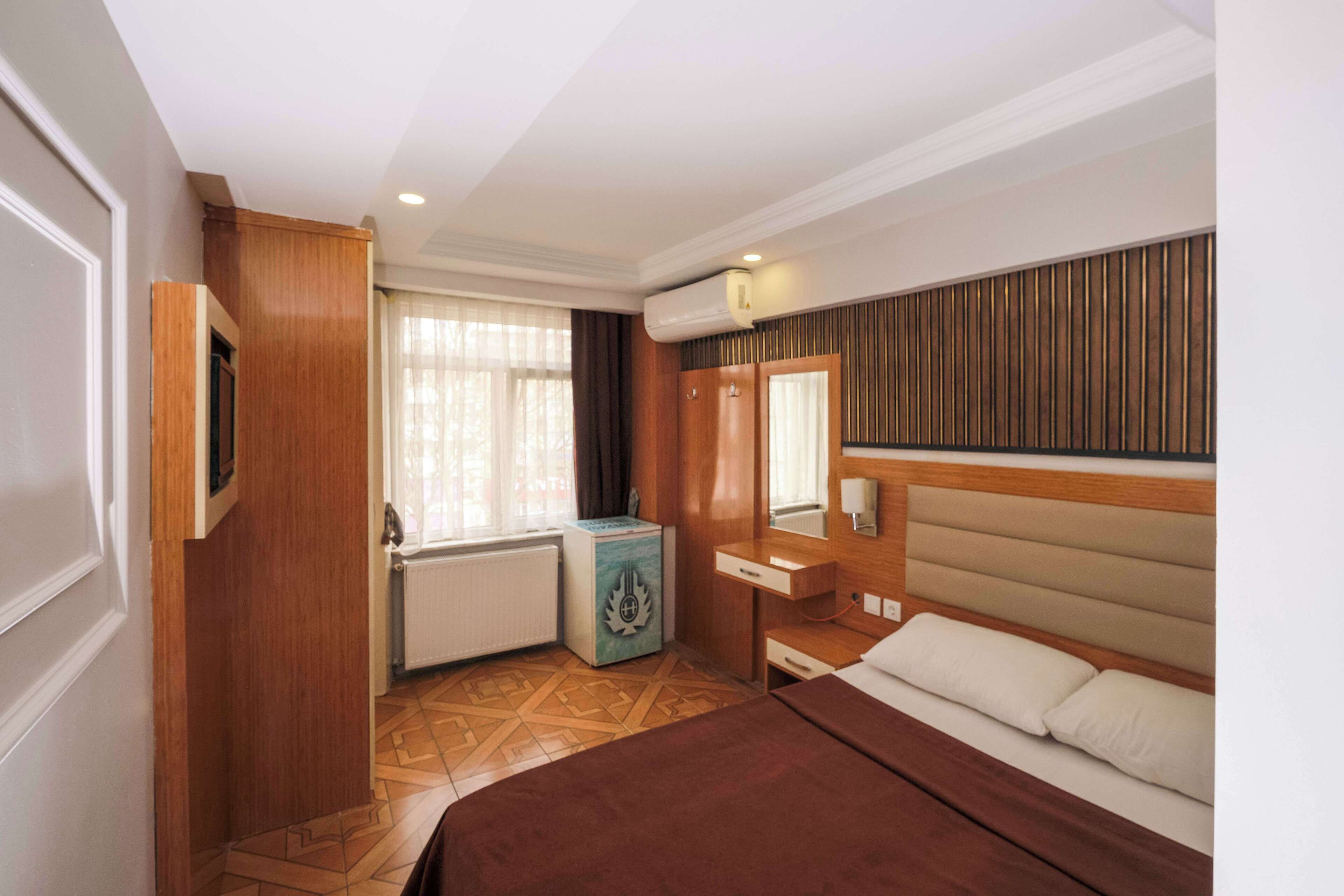 Standard Single Room | Minibar, in-room safe, blackout curtains, soundproofing
