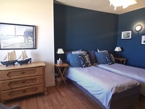 3 bedrooms, desk, iron/ironing board, travel cot