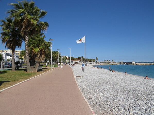 On the beach, sun-loungers