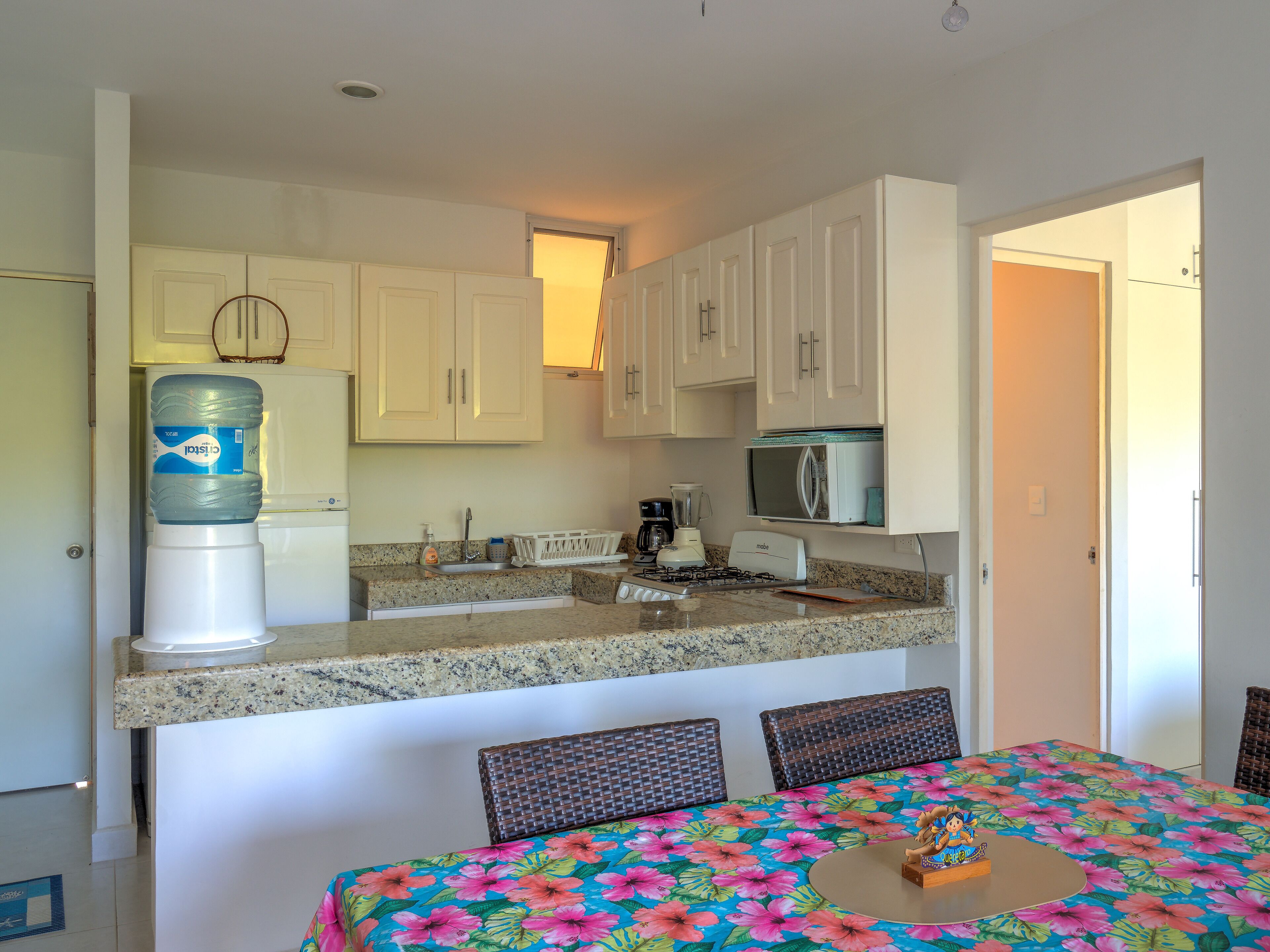 Flamingo Beach 3 bedroom condo, swimming pool, near beach.