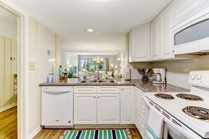 Fridge, microwave, oven, stovetop - Relaxing Condo Steps from Pool and 5-Minute Walk to Ocean! (Fernandina Beach)