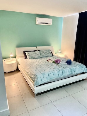 3 quartos, cofres nos quartos, ferros/tábuas de passar roupa