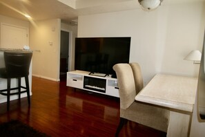 75" tv is great and the large table for work at home Folks - One Bedroom Luxury Condo Downtown Salt Lake City (Salt Lake City)