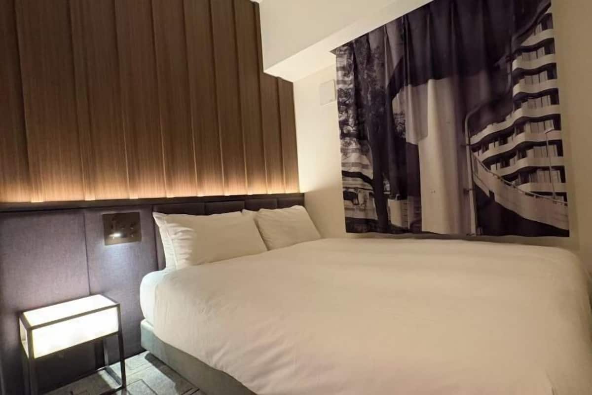 Down duvets, pillow-top beds, in-room safe, desk