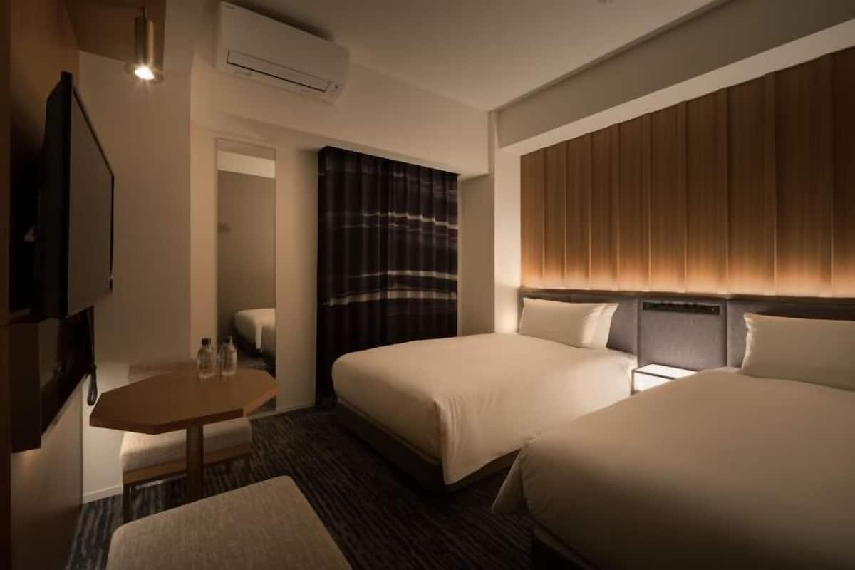 Down duvets, pillow-top beds, in-room safe, desk