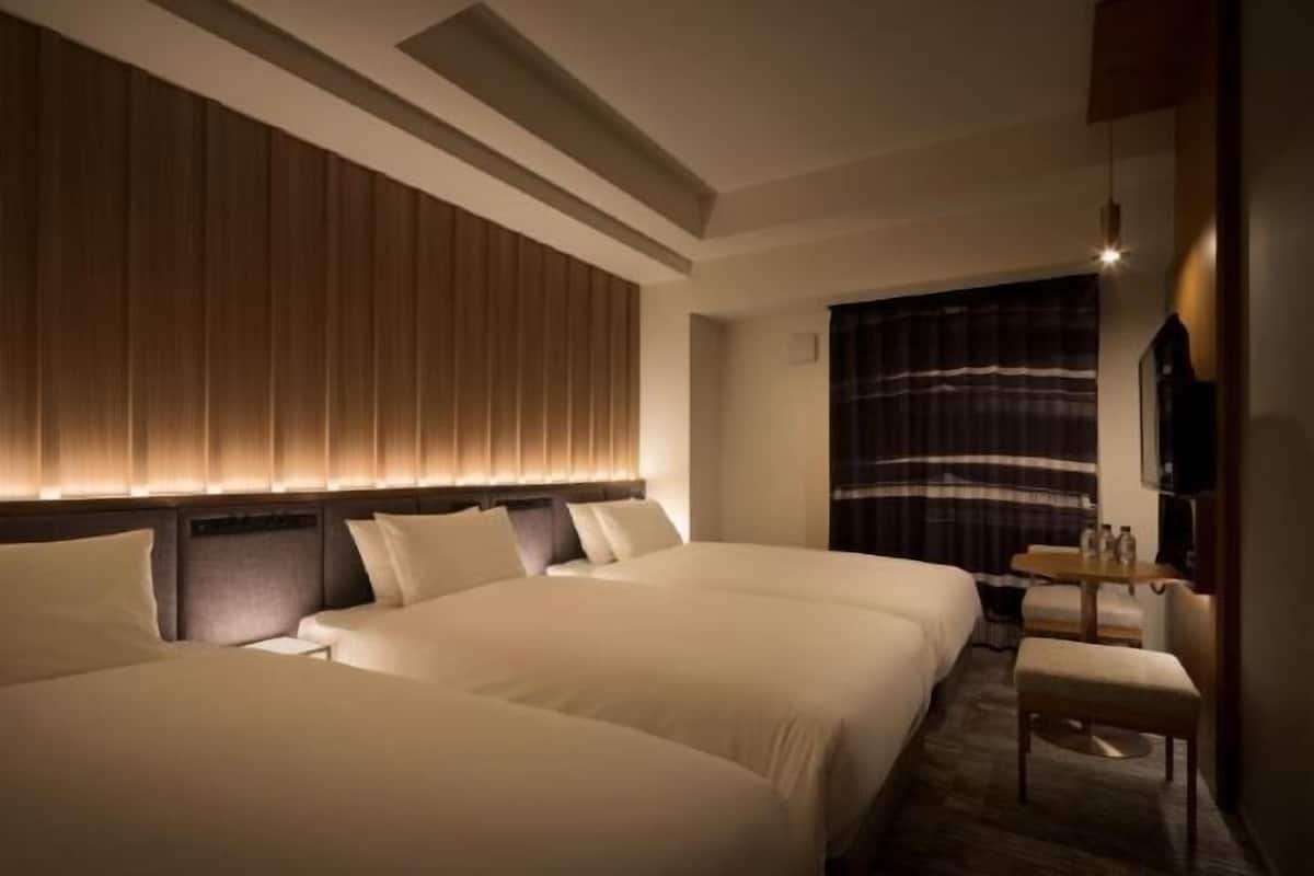 Down duvets, pillow-top beds, in-room safe, desk