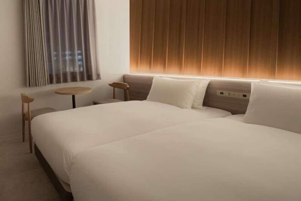 Down duvets, pillow-top beds, in-room safe, desk