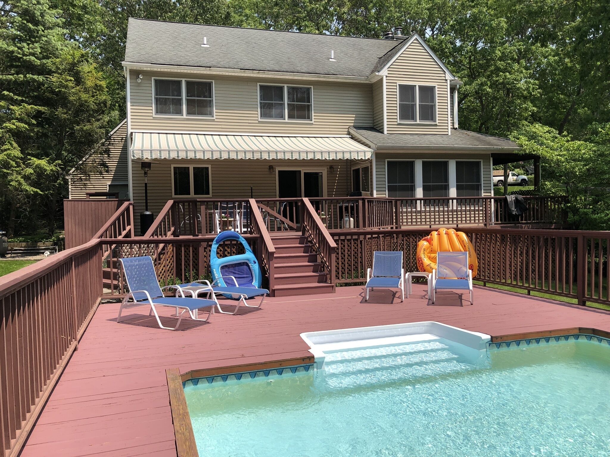 Hampton Bays home with heated pool