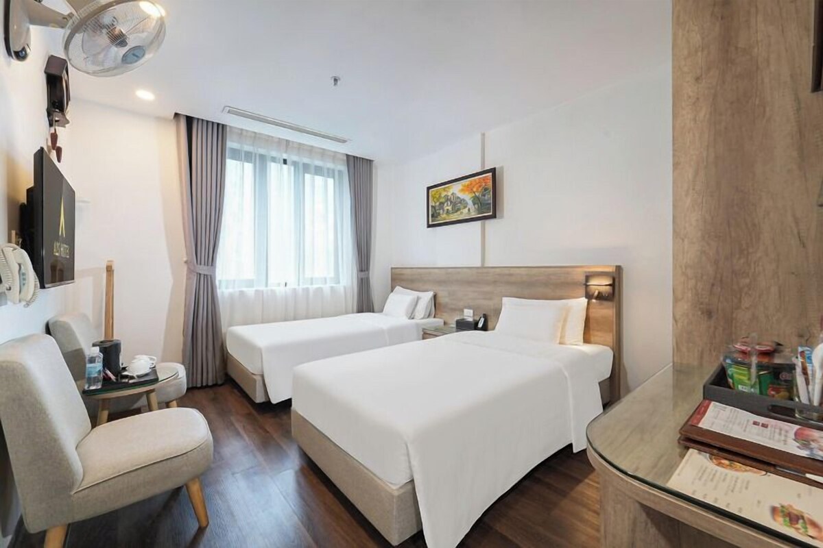 Phòng Deluxe | Minibar, két bảo mật tại phòng, màn/rèm cản sáng 