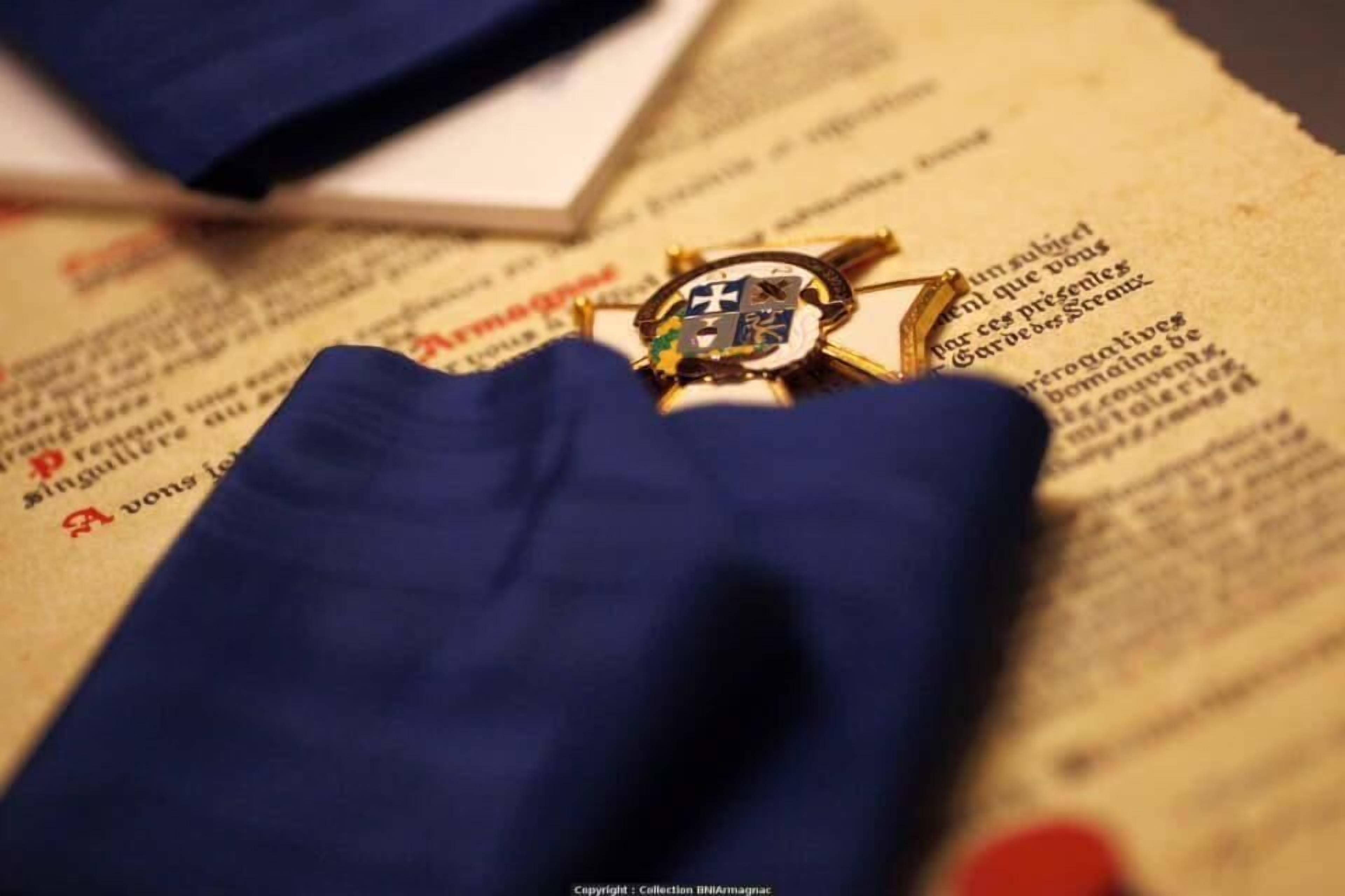 A book with a gold emblem on its cover.