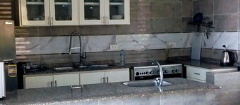 Modern, fully furnished one bedroom Apartment with a supermarket on-site.