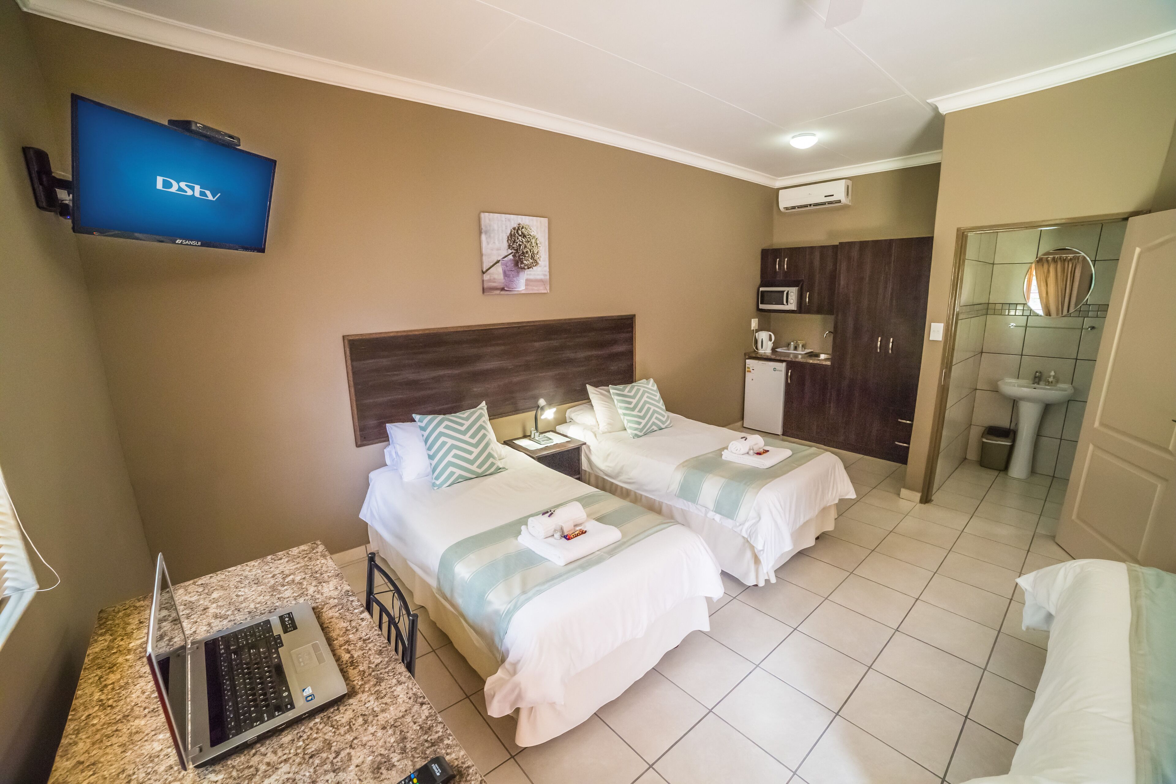 Family Room, Multiple Beds, Non Smoking, Garden View | In-room safe, individually decorated, individually furnished, desk