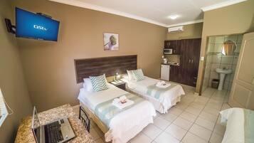 Family Room, Multiple Beds, Non Smoking, Garden View | In-room safe, individually decorated, individually furnished, desk