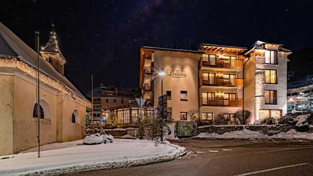 A hotel with a modern design, featuring multiple balconies and a prominent 'Hotel' sign. - Hotel Leitner (Rio di Pusteria)