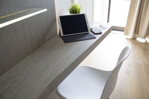 Kamar Double Superior | Meja kerja, tempat tidur bayi gratis, Wi-Fi gratis, dan seprai linen