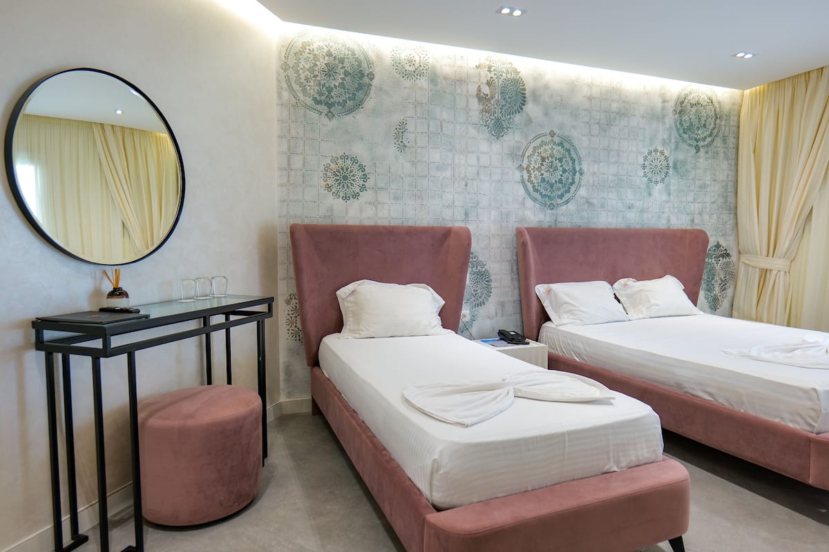 Family Room | 1 bedroom, in-room safe, iron/ironing board, free WiFi