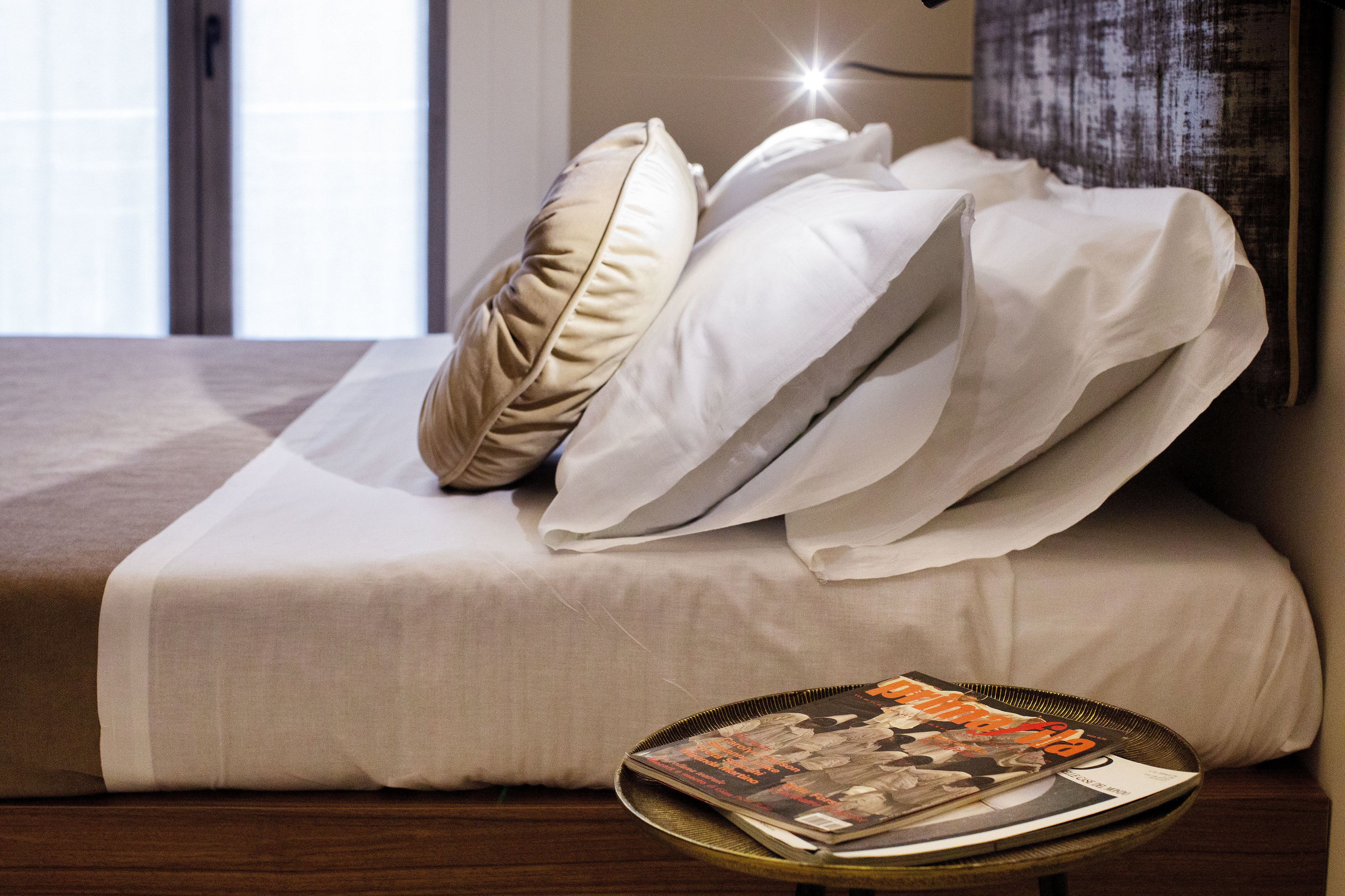 Premium bedding, memory-foam beds, minibar, in-room safe