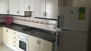 Apartment, 2 Bedrooms, Garden View | Private kitchen - 2 Bedroom Apartment in Oulad Khallouf (Oulad Khallouf)