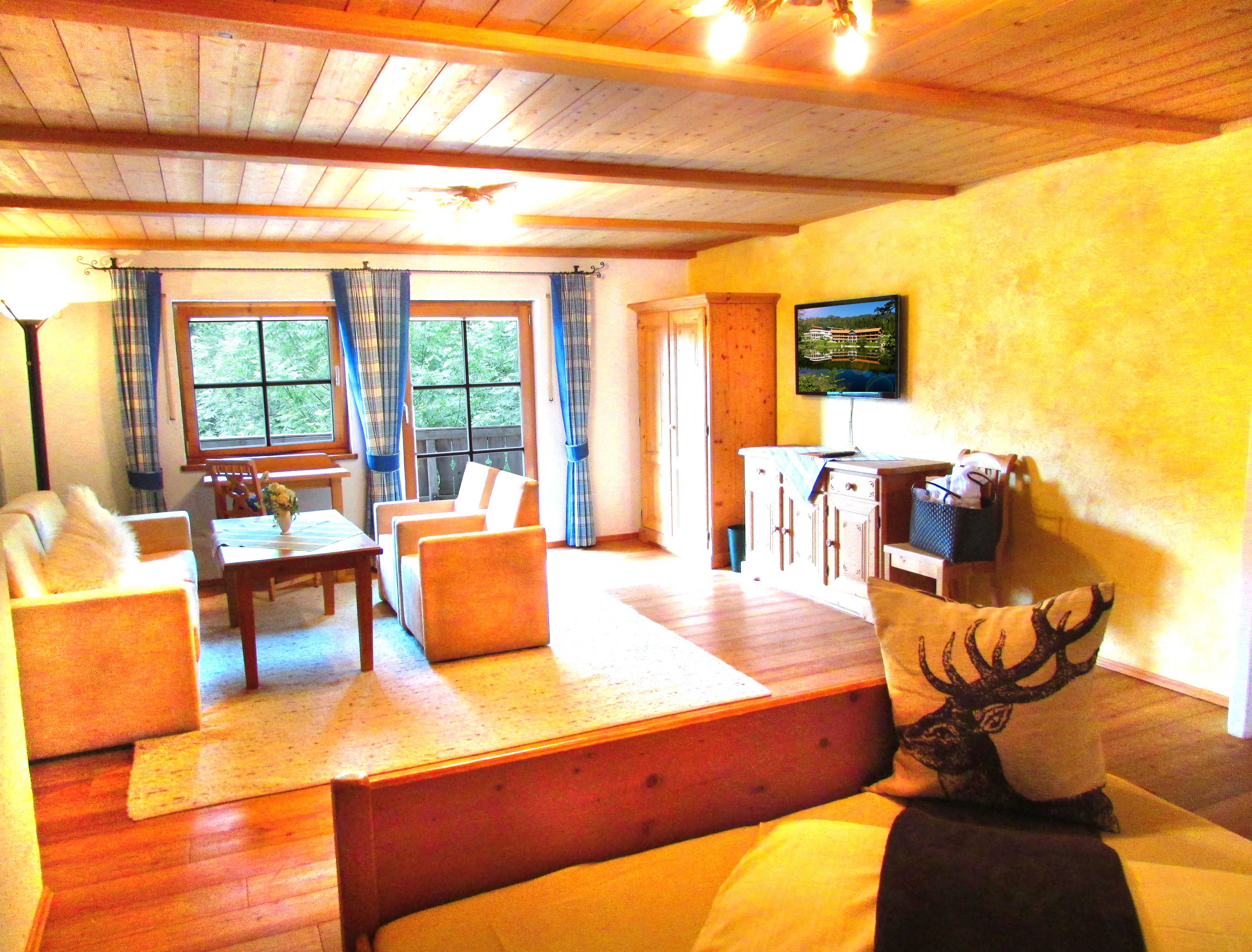 family double room | in-room safe, individually decorated, individually furnished, desk