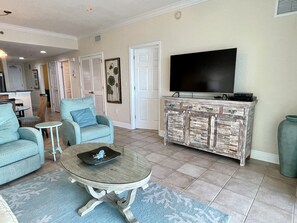 Smart TV, DVD player, foosball, books