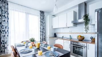 Superior Apartment, 2 Bedrooms | Private kitchen | Coffee/tea maker, fridge, stovetop, electric kettle