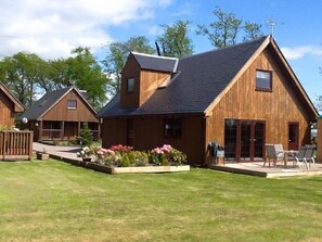 Deluxe Chalet, 4 Bedrooms, Non Smoking, Hot Tub (The Party Lodge) | Terrace/patio - La Fortuna Lodges (Stirling)