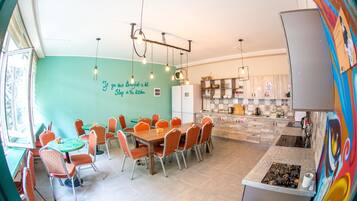 Basic Double Room, 1 Queen Bed, Shared Bathroom | Private kitchen | Fridge, microwave