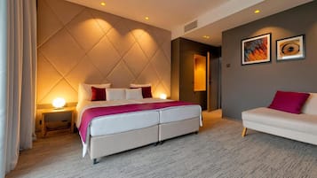 Ropa de cama de alta calidad y minibar