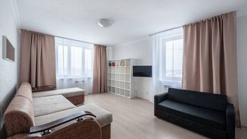 Comfort-Apartment, 1 Schlafzimmer, Nichtraucher, Stadtblick | Schreibtisch, Bügeleisen/Bügelbrett, kostenloses WLAN, Bettwäsche