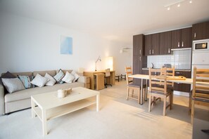 Apartment, 1 Bedroom, Garden View | Living room | Flat-screen TV, toys - Teguisol (Teguise)