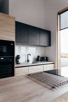 Two bedroom suite House with hot tub | Private kitchen | Full-size fridge, oven, stovetop, dishwasher