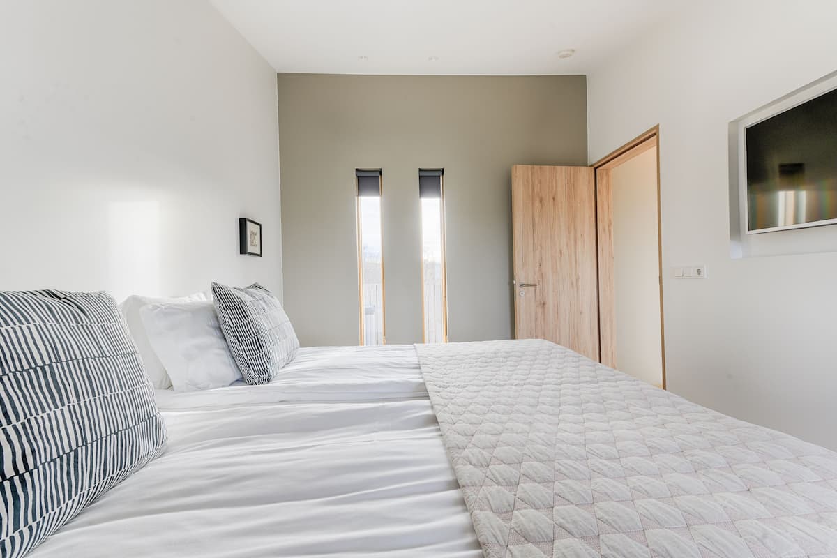 Blackout drapes, soundproofing, free WiFi, bed sheets