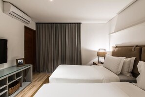 Deluxe kamer | 3 slaapkamers, een minibar, een kluis op de kamer