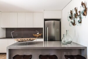 Deluxe Room | Shared kitchen | Full-size fridge, microwave, stovetop, blender