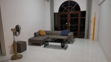 Family Villa | Living area | 42-inch LCD TV with cable channels, TV
