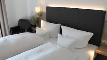 Minibar, coffres-forts dans les chambres, bureau, rideaux occultants
